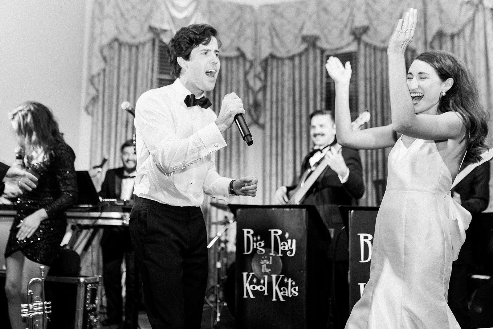 Big Ray and the Kool Kats bride and groom on stage